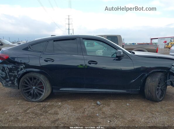 5UX33EX0XR9S29459 2024 BMW X6 Черный Вид задней части салона