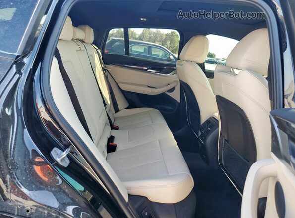 5UX43DT04P9S10245 2023 BMW X4 Black Widok wnętrza z tyłu