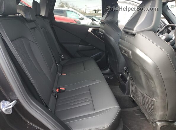 5UX53GP08S9Y88893 2025 BMW X3 Charcoal Widok wnętrza z tyłu