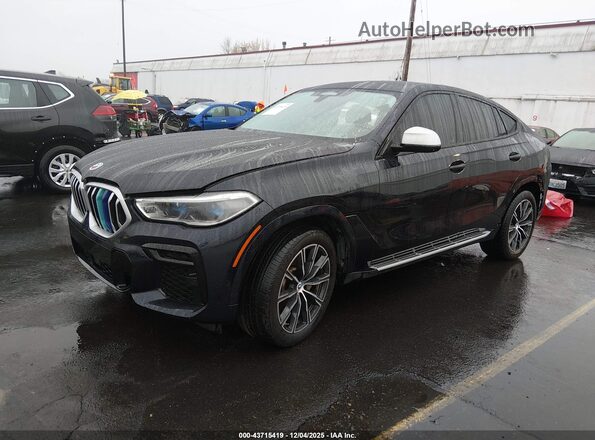5UXCY6C00P9S03866 2023 BMW X6 Blue Vista tres cuartos delantera izquierda