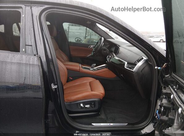 5UXCY6C00P9S03866 2023 BMW X6 Blue Vista interior delantera