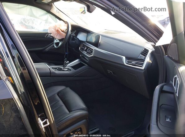 5UXCY6C04M9E35207 2021 BMW X6 Black Vista interior delantera