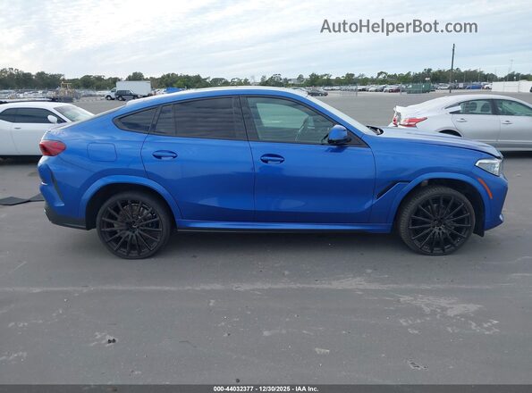 5UXCY8C05L9C66552 2020 BMW X6 Blue Widok wnętrza z tyłu