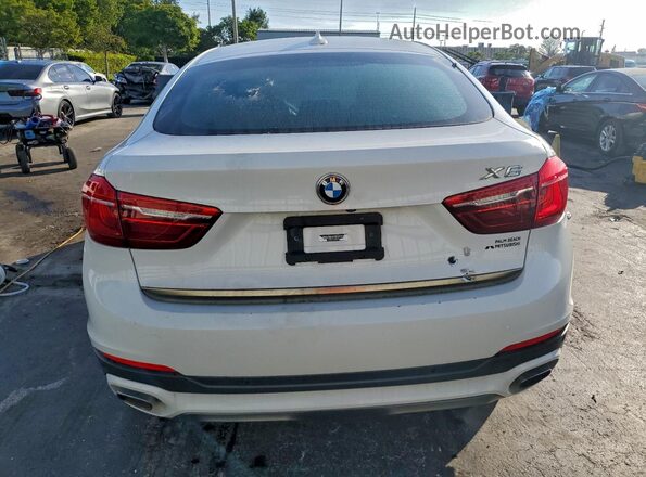 5UXKU6C58KLP60670 2019 BMW X6 White Vista trasera