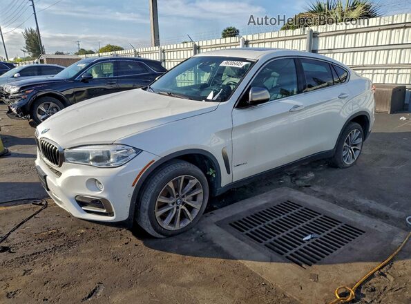 5UXKU6C58KLP60670 2019 BMW X6 White Vista tres cuartos delantera izquierda