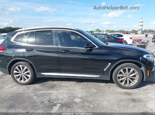 5UXTR7C59KLE88290 2019 BMW X3 Черный Вид задней части салона