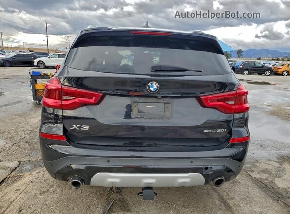 5UXTY3C09L9C69473 2020 BMW X3 Black Widok z tyłu
