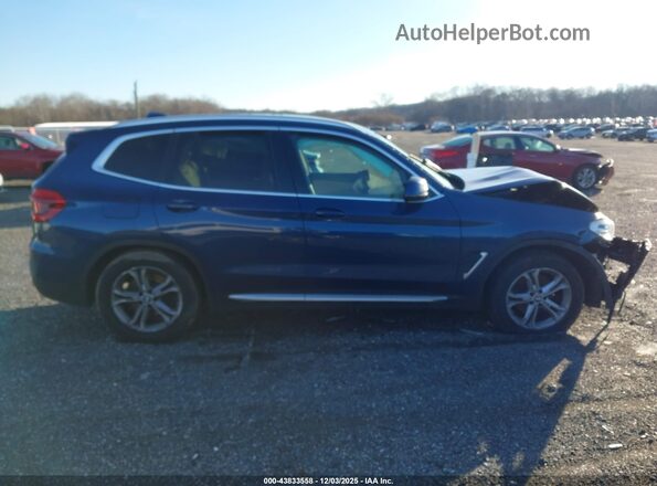 5UXTY5C03M9E70637 2021 BMW X3 Blue Widok wnętrza z tyłu