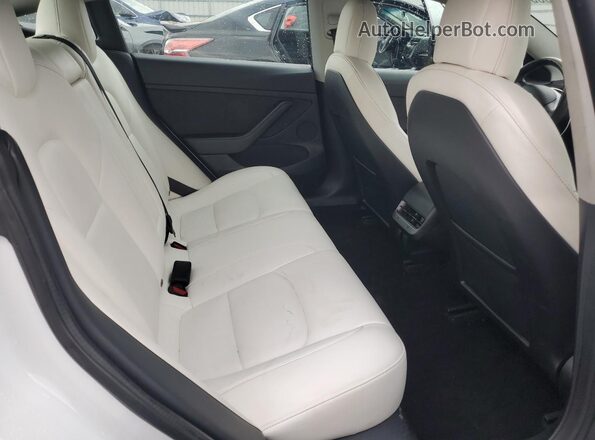5YJ3E1EB2NF115254 2022 TESLA MODEL White Vista de los asientos traseros