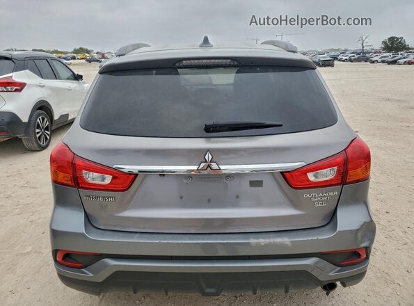 JA4AP4AW2JU002184 2018 MITSUBISHI OUTLANDER Серый Вид салона спереди