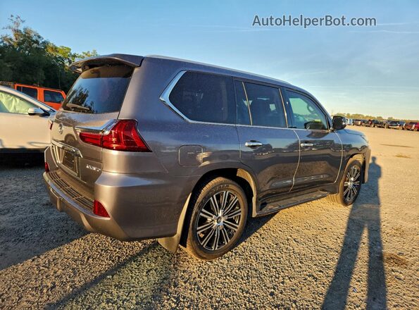 JTJDY7AX1L4316872 2020 LEXUS LX Gray Front right