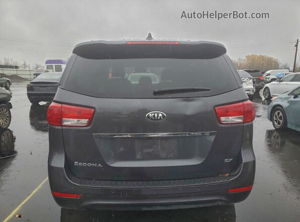 KNDMC5C16J6399280 2018 KIA SEDONA Silver Vista interior delantera