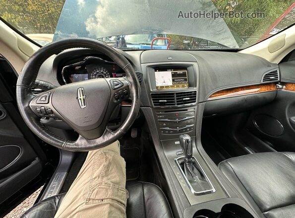 2LMHJ5AT1GBL01391 2016 LINCOLN MKT Черный Вид задних сидений