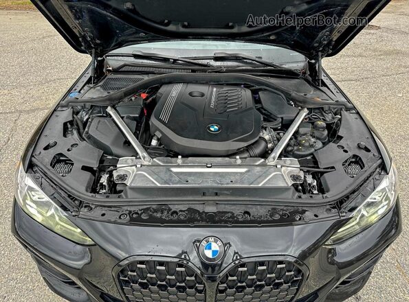 WBA13AR09MCF20741 2021 BMW M4 Black Widok wnętrza z przodu