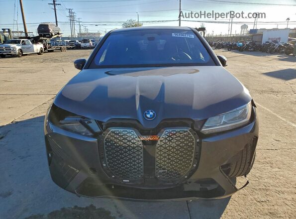 WB523CF04RCN74259 2024 BMW IX Gray Vista trasera