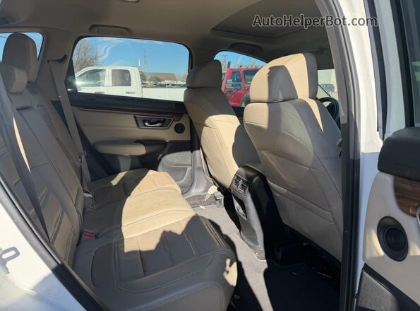 2HKRW1H84JH507445 2018 HONDA CRV Белый Вид салона спереди
