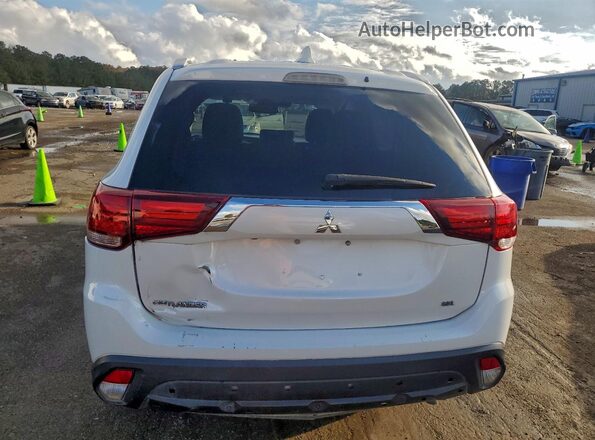JA4AD3A39LZ018719 2020 MITSUBISHI OUTLANDER Белый Вид салона спереди