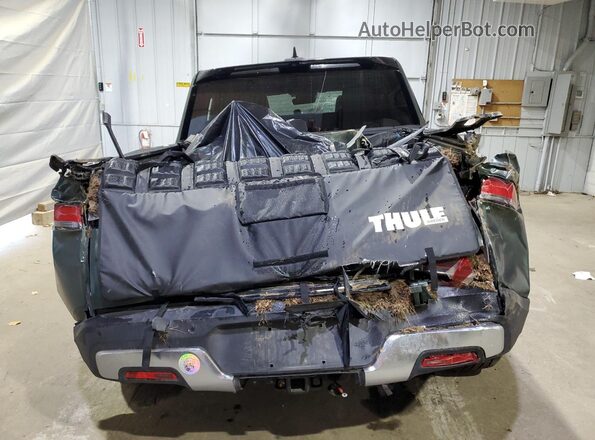 7FCTGAAA3RN034014 2024 RIVIAN R1T Green Rear view