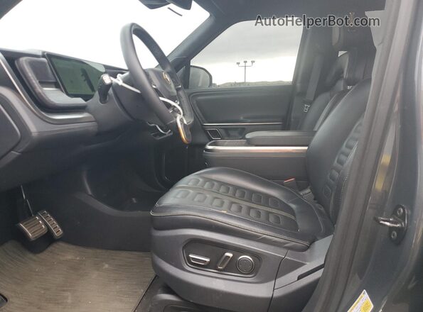 7PDSGABA4RN042504 2024 RIVIAN R1S Charcoal Vista interior delantera