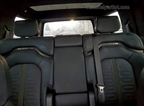 7PDSGABL6RN034809 2024 RIVIAN R1S Green Rear seats view
