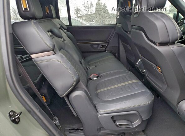 7PDSGABL6RN034809 2024 RIVIAN R1S Green Rear interior view