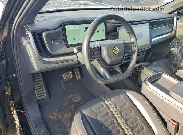 7PDSGCBA4RN032504 2024 RIVIAN R1S Black Vista del salpicadero