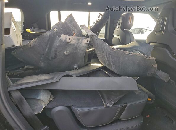 7PDSGCBA4RN032504 2024 RIVIAN R1S Black Vista de los asientos traseros