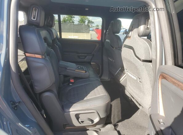 7PDSGCBP5SN059334 2025 RIVIAN R1S Серый Вид задней части салона