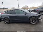 2025 Tesla Model Y Long Range Dual Motor All-wheel Drive Gray vin: 7SAYGAEE5SF216913