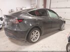 2024 Tesla Model Y   Gray vin: 7SAYGDED3RF054296