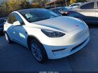 2024 Tesla Model Y Long Range Dual Motor All-wheel Drive White vin: 7SAYGDEE0RA252906