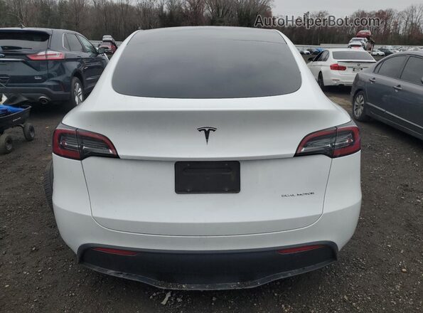 7SAYGDEE0RA291088 2024 TESLA MODEL White Հետևի տեսք