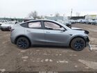 2025 Tesla Model Y Long Range Dual Motor All-wheel Drive Gray vin: 7SAYGDEE0SA338433