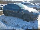 2025 Tesla Model Y Long Range Dual Motor All-wheel Drive Gray vin: 7SAYGDEE0SF299491