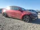 2026 Tesla Model Y Red vin: 7SAYGDEE0TF349971