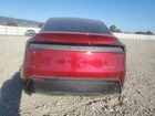 2026 Tesla Model Y Red vin: 7SAYGDEE0TF349971