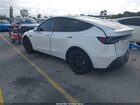 2026 Tesla Model Y Long Range Dual Motor All-wheel Drive/long Range Launch Series White vin: 7SAYGDEE1TF368741