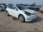 2023 Tesla Model Y Awd/long Range Dual Motor All-wheel Drive White vin: 7SAYGDEE4PA045903