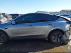 2026 Tesla Model Y Long Range Dual Motor All-wheel Drive/long Range Launch Series Silver vin: 7SAYGDEE4TA396725