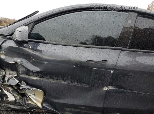7SAYGDEE6TF408652 2026 TESLA MODEL Gray Вид салону спереду