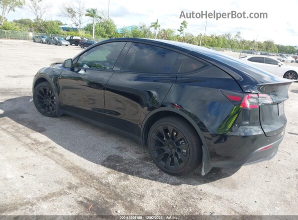 7SAYGDEE7NF319241 2022 TESLA MODEL Y Black Rear left