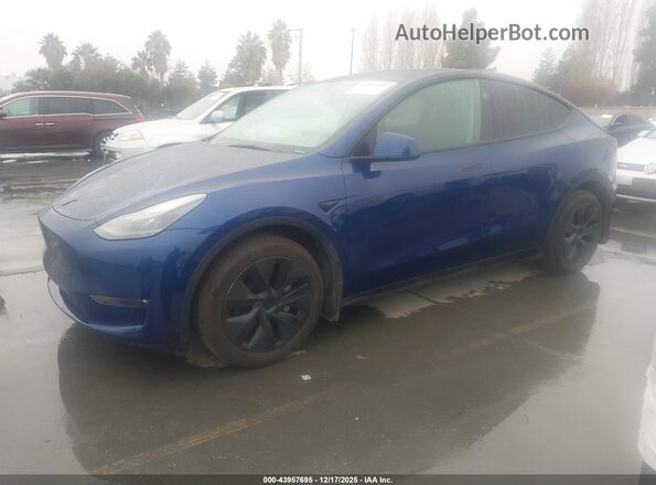 7SAYGDEE8SF238602 2025 TESLA MODEL Y Blue Առջևի ձախ երեք քառորդ տեսարան
