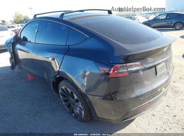 7SAYGDEFXRF161489 2024 TESLA MODEL Y Gray Tył lewy