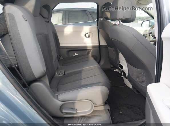 7YAKM4DB4SY037193 2025 HYUNDAI IONIQ 5 Light Blue Вид задних сидений