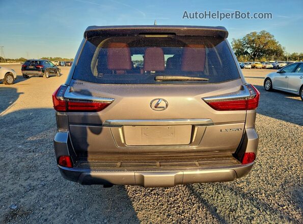 JTJDY7AX1L4316872 2020 LEXUS LX Gray Front interior view