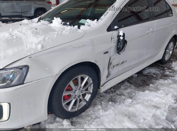 JA32U2FU1GU004594 2016 MITSUBISHI LANCER Белый Вид задней части салона