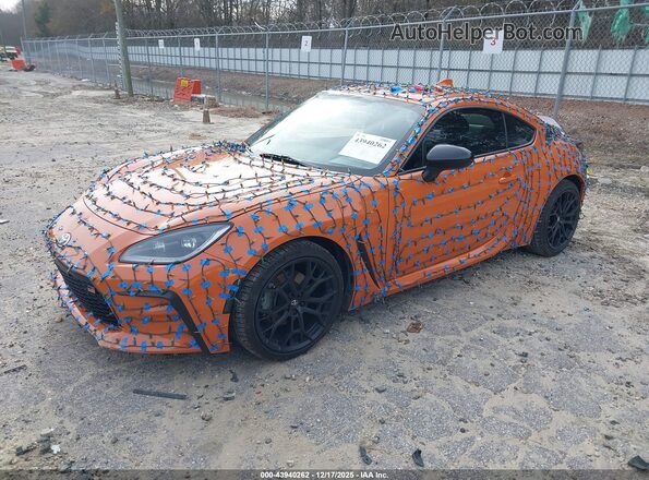 JF1ZNBG15P9755935 2023 TOYOTA GR86 Оранжевый Передняя левая четверть