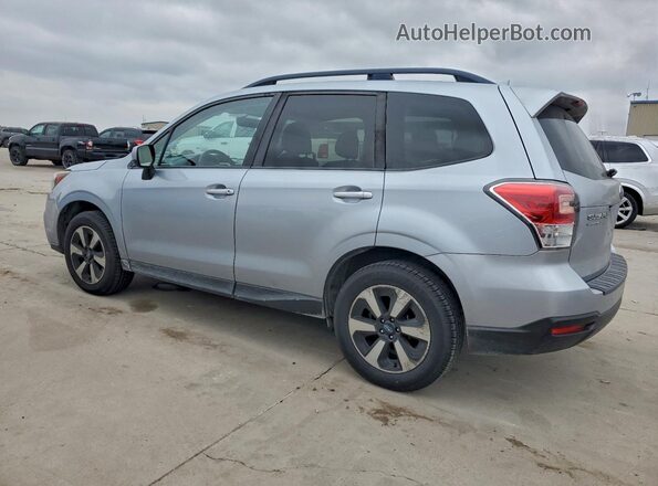 JF2SJADC9HH496382 2017 SUBARU FORESTER 2.5 Серебряный Задняя левая четверть
