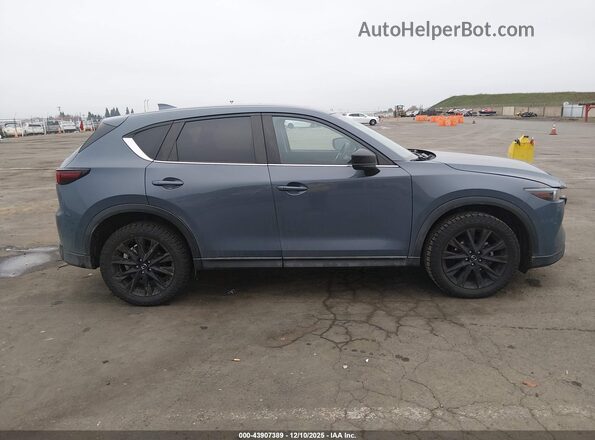JM3KFBCM2N0642879 2022 MAZDA CX-5 Blue Vista interior trasera