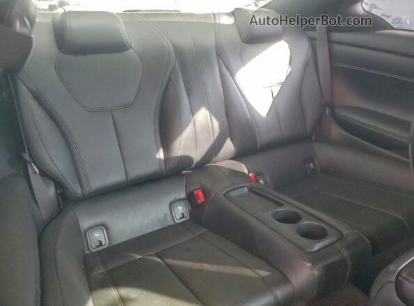 JN1EV7EL4JM392903 2018 INFINITI Q60 White Vista de los asientos traseros